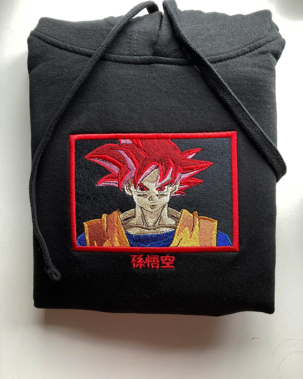 Goku (Super Saiyan God)